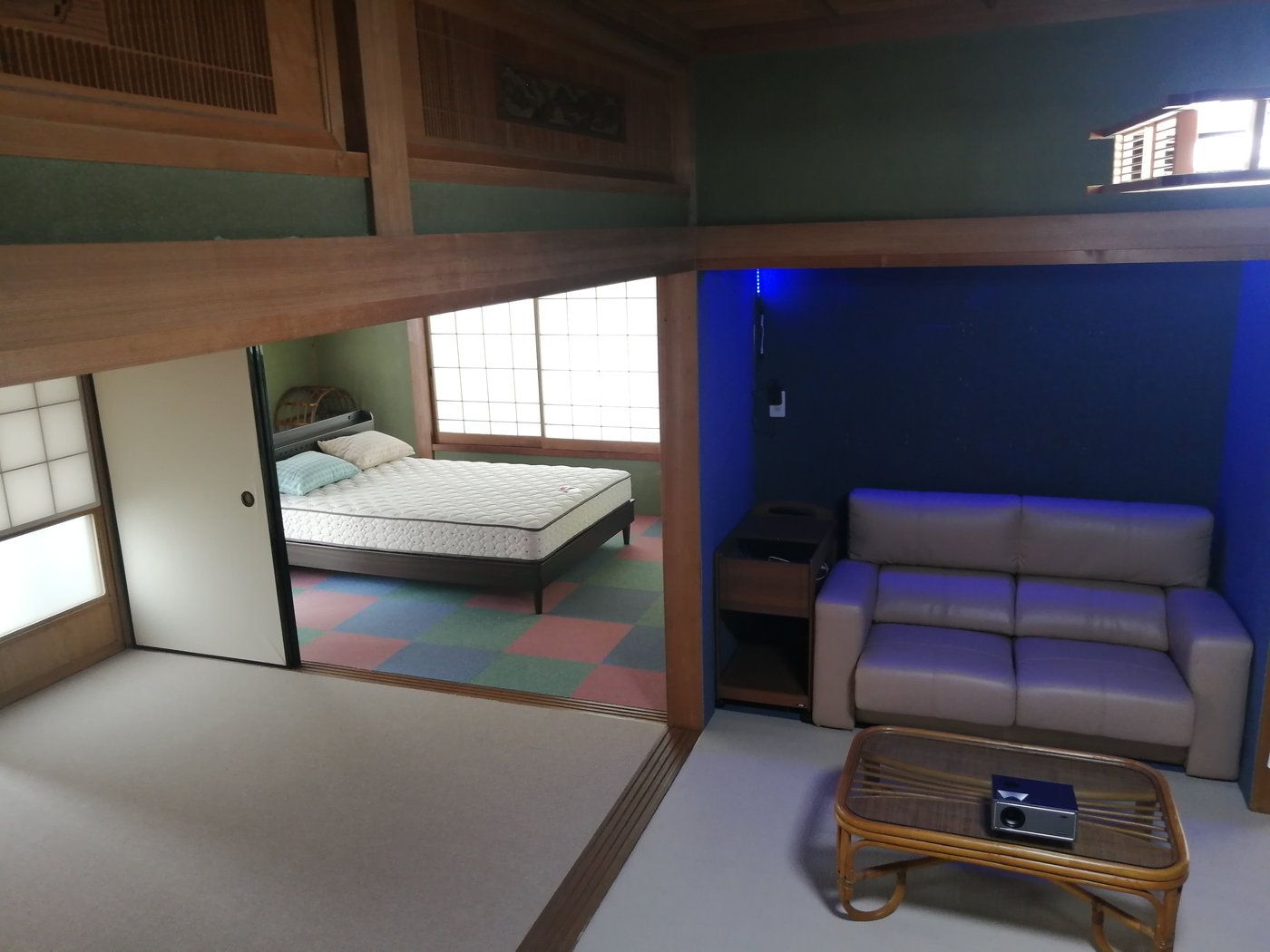 Living room with sofa and tatami area